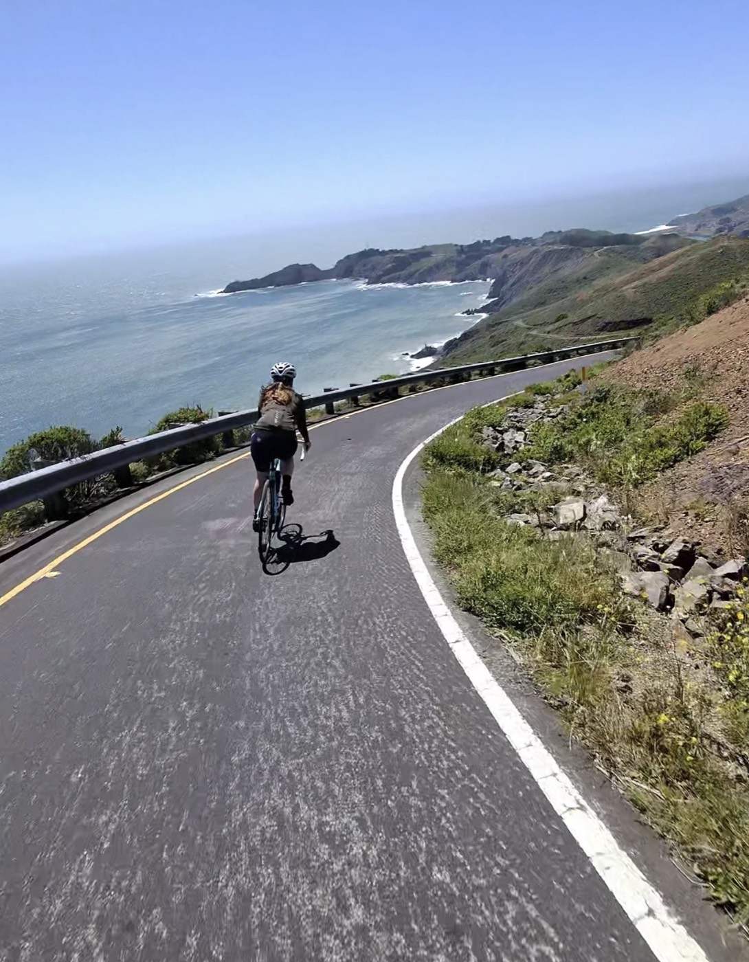 Cycling the coast road at Hawk Hill